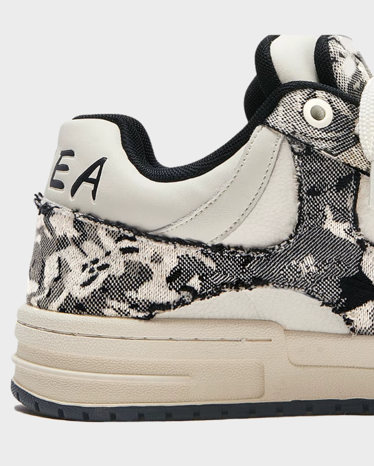 Fuzzy Low White Black Sneakers