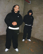 Black hoodie and wide-leg sweatpants set  Street-style minimalist fashion trend sportswear set Neutral-style streetwear fashion