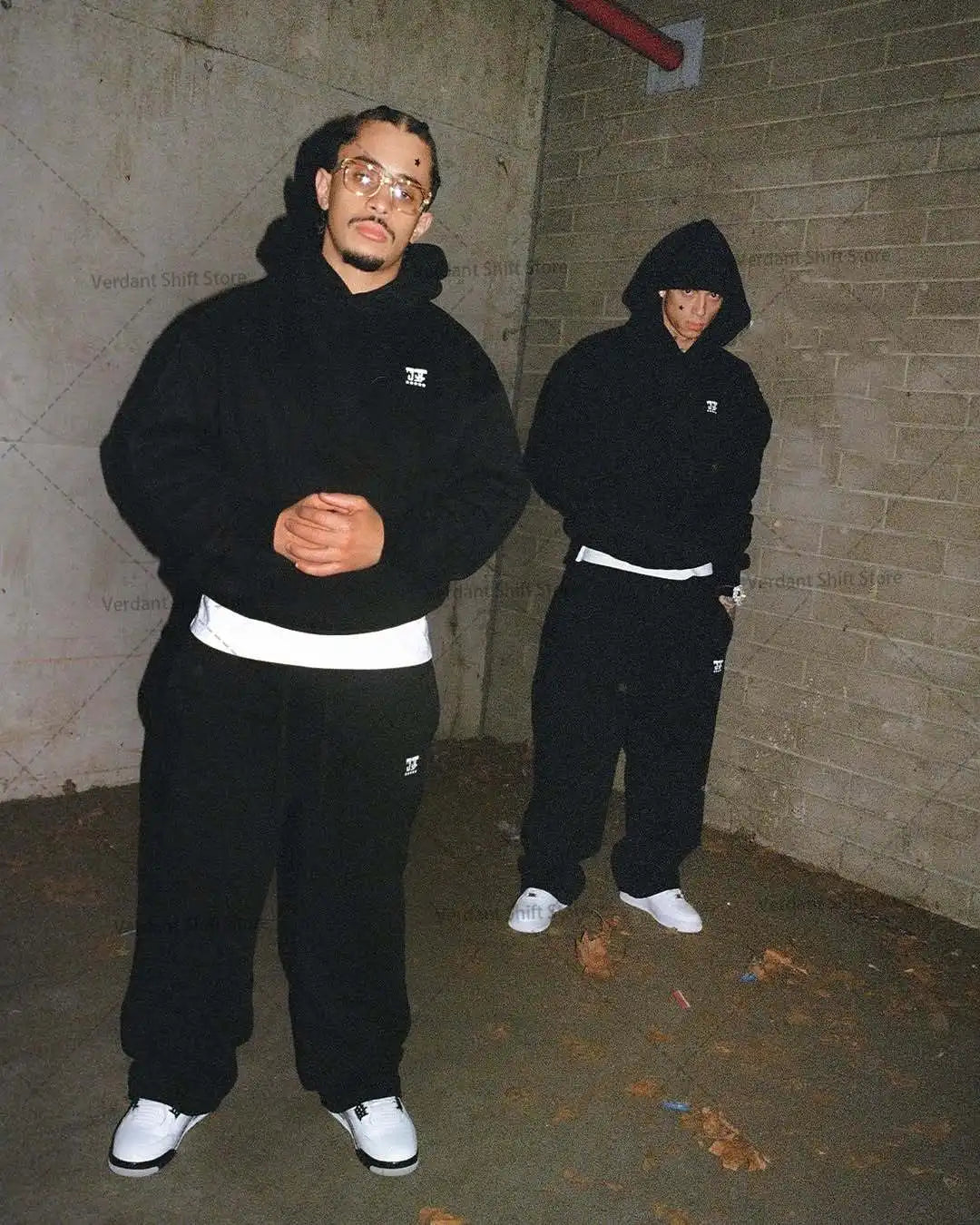 Black hoodie and wide-leg sweatpants set  Street-style minimalist fashion trend sportswear set Neutral-style streetwear fashion