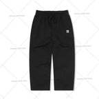 Black hoodie and wide-leg sweatpants set  Street-style minimalist fashion trend sportswear set Neutral-style streetwear fashion