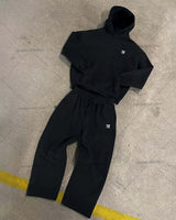 Black hoodie and wide-leg sweatpants set  Street-style minimalist fashion trend sportswear set Neutral-style streetwear fashion