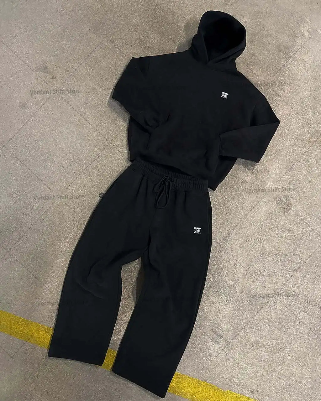 Black hoodie and wide-leg sweatpants set  Street-style minimalist fashion trend sportswear set Neutral-style streetwear fashion