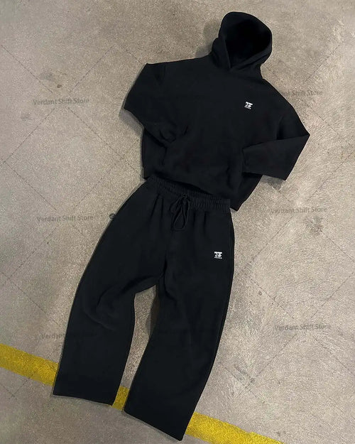 Black hoodie and wide-leg sweatpants set  Street-style minimalist fashion trend sportswear set Neutral-style streetwear fashion